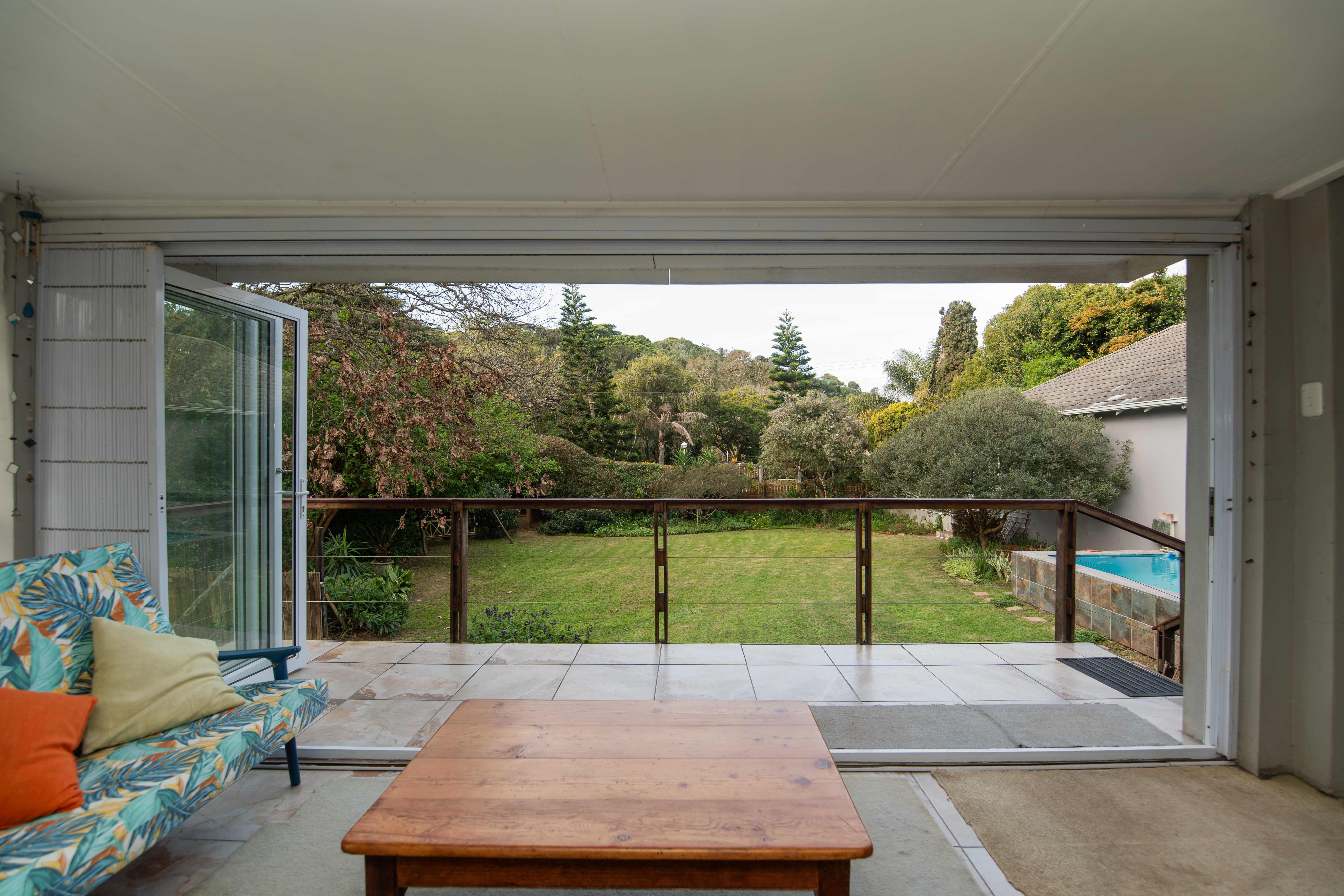 Open-plan entertainment and games room opening to patio