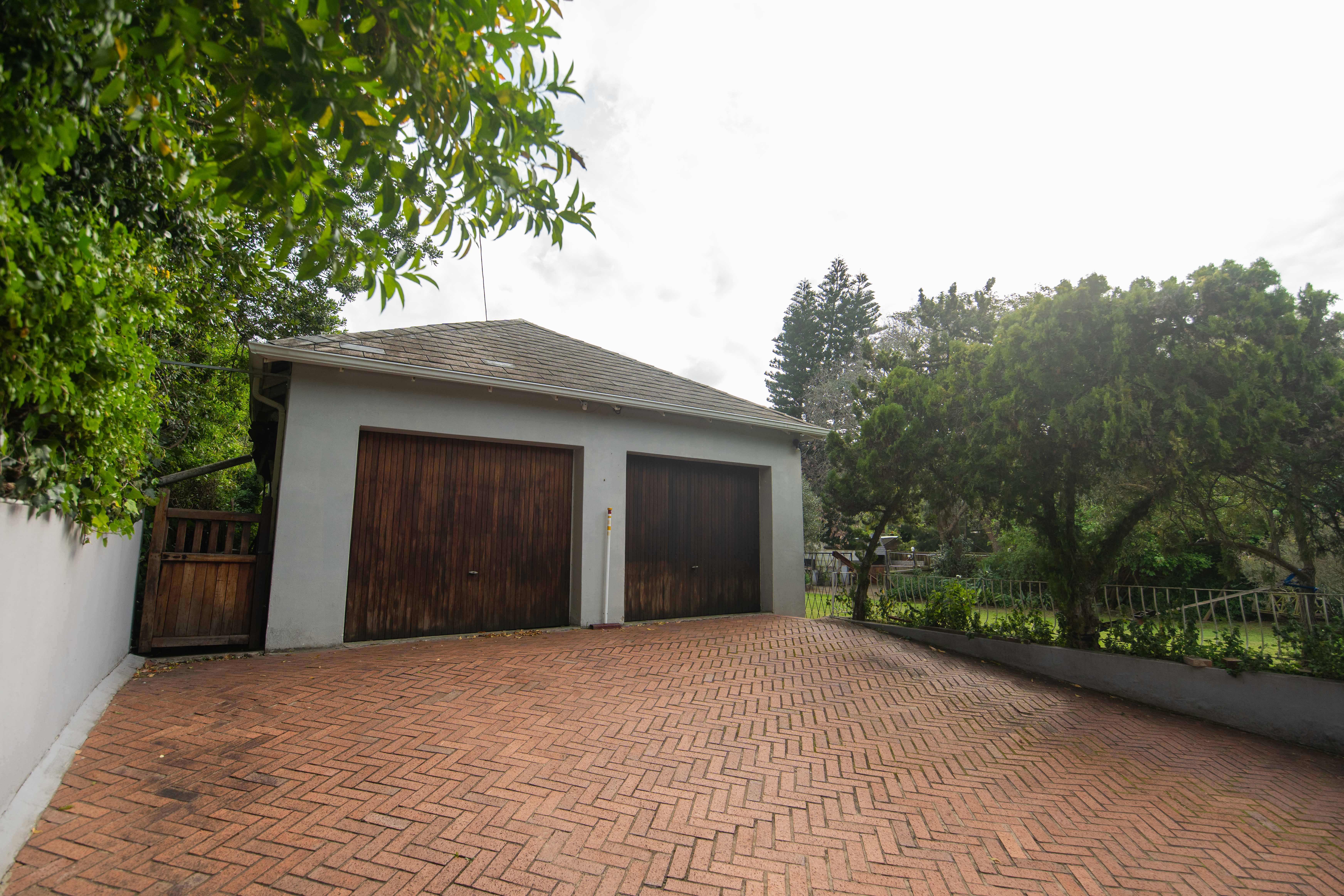 Four vehicle garage and workshop building
